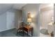 Hallway with view of bedroom and bathroom, plus small side table at 180 Winecoff Dr, Fayetteville, GA 30214