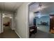 A hallway leading to a kitchenette and seating area at 180 Winecoff Dr, Fayetteville, GA 30214