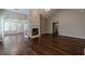 Spacious living room with hardwood floors, fireplace, and ample natural light at 180 Winecoff Dr, Fayetteville, GA 30214