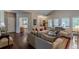 Spacious living room with hardwood floors and views to the kitchen at 180 Winecoff Dr, Fayetteville, GA 30214