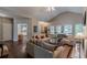 Living room featuring hardwood floors, neutral colors, and natural light at 180 Winecoff Dr, Fayetteville, GA 30214
