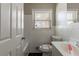 Bathroom featuring white subway tile, bathtub, toilet, and vanity at 1561 Rupert Rd, Decatur, GA 30032