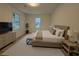 Spacious bedroom with natural light from two windows, modern decor and furnishings at 3663 Heatherwood Ne Dr, Marietta, GA 30066
