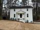 Charming two-story home boasts fresh white siding and a welcoming front porch at 3663 Heatherwood Ne Dr, Marietta, GA 30066