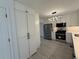 Spacious modern kitchen features stainless appliances, bright lighting and ample storage at 3663 Heatherwood Ne Dr, Marietta, GA 30066
