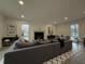 Cozy living room featuring a fireplace, recessed lights, and an open layout to the dining area at 3663 Heatherwood Ne Dr, Marietta, GA 30066