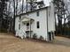 Corner view of two-story home with new two-car garage at 3663 Heatherwood Ne Dr, Marietta, GA 30066