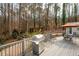 Spacious backyard deck perfect for entertaining, includes grill and outdoor dining set at 4811 Brookwood Sw Dr, Mableton, GA 30126