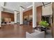 Spacious lobby with wood paneling, brick floors, modern furnishings, and open layout at 2575 Peachtree Ne Rd # 4G, Atlanta, GA 30305