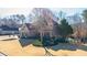 Aerial view of a two-story home with manicured landscaping and sprawling lawn at 4095 Copper Leaf Ln, Cumming, GA 30040