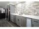 Modern kitchenette with gray cabinets, white countertops and stainless steel appliances at 4095 Copper Leaf Ln, Cumming, GA 30040