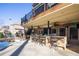 Outdoor bar area featuring stone accents and a full view of the pool at 4095 Copper Leaf Ln, Cumming, GA 30040