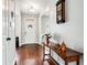 Inviting foyer with wood floors, white trim, and a bright, welcoming atmosphere at 2600 Reece Farms Sw Trl, Powder Springs, GA 30127