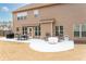 Spacious patio features seating, a grill, and an awning at 2600 Reece Farms Sw Trl, Powder Springs, GA 30127