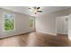Bedroom with wood-look floors, two windows providing natural light, and neutral colored walls at 420 Copeland St, Grayson, GA 30017