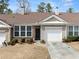 Inviting single-story home with a one-car garage, attractive brick accents, and a neatly maintained lawn at 420 Copeland St, Grayson, GA 30017