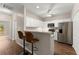 Open kitchen features stainless steel appliances, breakfast bar, and lots of cabinet storage space at 420 Copeland St, Grayson, GA 30017