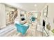 Open-concept living area with modern furnishings and decor, seamlessly flowing into the dining space at 6242 Marbut Farms Ln, Lithonia, GA 30058