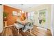 Bright dining room with hardwood floors, stylish decor, and natural light at 1976 Drennon Ave, Austell, GA 30106