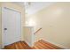 Hallway with wood floors and neutral walls and white doors and trim at 1976 Drennon Ave, Austell, GA 30106