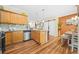 Well-equipped kitchen with hardwood floors, ample storage, and stainless steel appliances at 1976 Drennon Ave, Austell, GA 30106