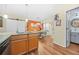 Bright kitchen featuring granite countertops, a dining area, and backyard access at 1976 Drennon Ave, Austell, GA 30106
