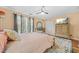Comfortable main bedroom with neutral walls, wood floors and lots of natural light at 1976 Drennon Ave, Austell, GA 30106