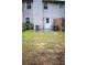 Backyard patio with small table and chairs perfect for enjoying the outdoors at 3736 Soapstone Rd, Decatur, GA 30034