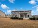 Large backyard features a covered patio and a private outdoor space at 405 Sora Dr, Stockbridge, GA 30281