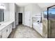 Bathroom with bathtub, tiled shower, and double vanity sink at 405 Sora Dr, Stockbridge, GA 30281