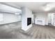 Open floor plan featuring a fireplace with a view of the adjoining rooms at 405 Sora Dr, Stockbridge, GA 30281