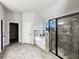 Elegant bathroom featuring a soaking tub, separate shower, and tile accents at 405 Sora Dr, Stockbridge, GA 30281