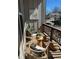 Cozy outdoor balcony with stylish seating, decorative art, and neighborhood views at 68 Adore Se Ct, Atlanta, GA 30315