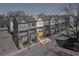 Attractive townhome row with colorful facades, covered balconies and sidewalks at 68 Adore Se Ct, Atlanta, GA 30315
