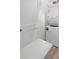 Compact laundry area equipped with a stacked washer and dryer unit at 68 Adore Se Ct, Atlanta, GA 30315