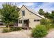 Beautifully designed home with an inviting covered porch and meticulous landscaping for serene curb appeal at 1015 Loliver Ln, Chattahoochee Hills, GA 30268