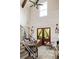 Bright living room with high ceilings, a cozy seating area, and stylish decor at 1015 Loliver Ln, Chattahoochee Hills, GA 30268