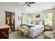Serene primary bedroom with neutral tones, stylish furniture, and a vaulted ceiling at 1015 Loliver Ln, Chattahoochee Hills, GA 30268