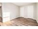 Bedroom featuring modern flooring, white trim and doors, perfect for comfortable living at 1534 Norman Xing, Atlanta, GA 30349