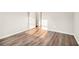 Sun-drenched bedroom with wood-look floors and neutral walls creates a relaxing atmosphere at 1534 Norman Xing, Atlanta, GA 30349