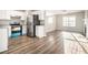 Modern kitchen featuring stainless steel appliances, granite counters, and ample storage space at 1534 Norman Xing, Atlanta, GA 30349