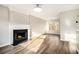 Inviting living space featuring wood floors, a fireplace, and neutral-colored walls at 1534 Norman Xing, Atlanta, GA 30349