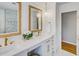 Elegant bathroom featuring double sinks, white cabinetry, and designer fixtures at 3519 Sunderland Ne Way, Brookhaven, GA 30319