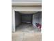 Open garage with painted walls and concrete floor at 4233 Viewpoint Ln, Ellenwood, GA 30294