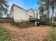 Backyard showing elevated deck and stairs to patio at 155 Mine Run, Fayetteville, GA 30215
