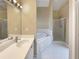 Bright bathroom features a soaking tub, a separate glass shower, and double sinks at 155 Mine Run, Fayetteville, GA 30215