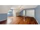 Spacious primary bedroom with hardwood floors, natural light, and large closet at 155 Mine Run, Fayetteville, GA 30215