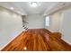 Bright living room featuring hardwood floors, recessed lighting, and stairs leading to the next level at 155 Mine Run, Fayetteville, GA 30215