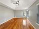 Large main bedroom with hardwood floors, a vaulted ceiling, and a ceiling fan at 155 Mine Run, Fayetteville, GA 30215
