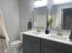 Bathroom featuring dual vanity, quartz countertops, and stylish accents creates a spa-like atmosphere at 229 Evergreen Trl # D, Cartersville, GA 30121